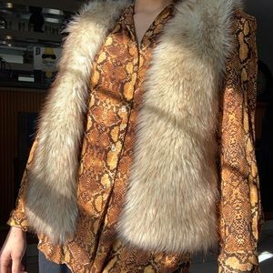 Zara snakeskin high low blouse in a size small